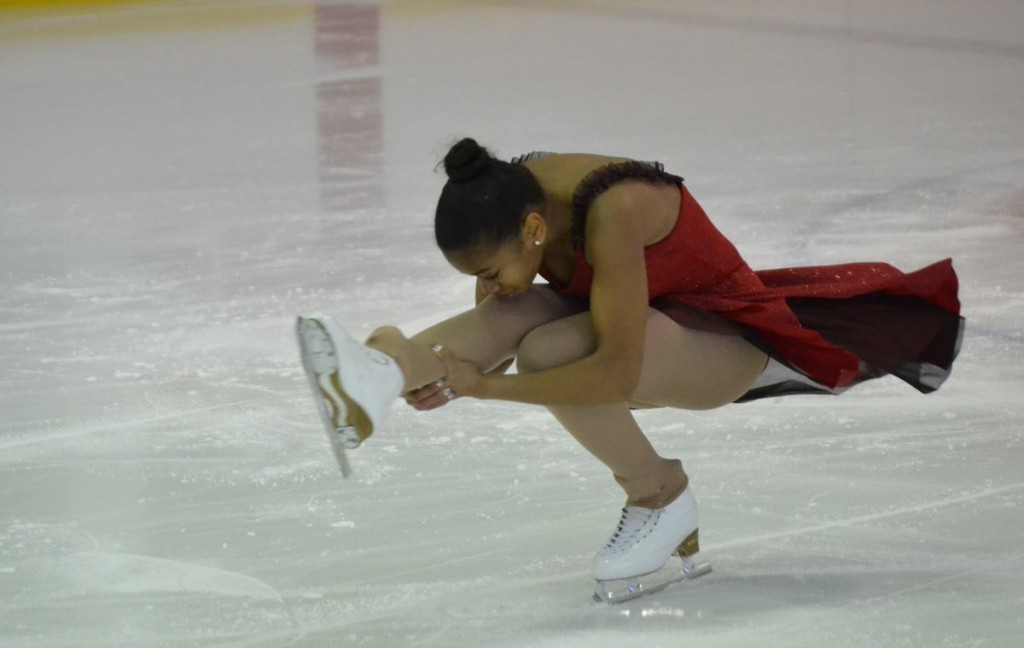 Figure skater holding leg straight