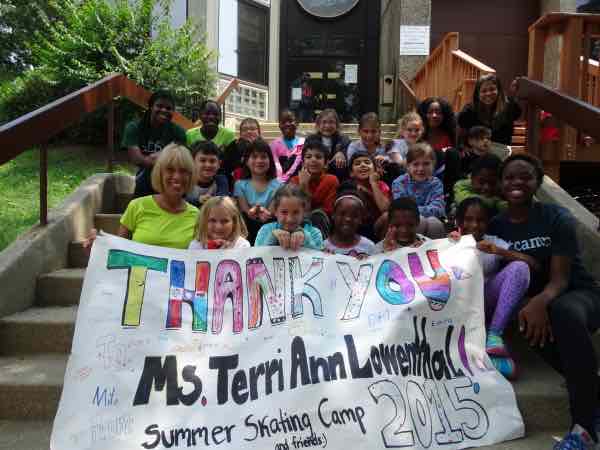 Thank you - kids on step holding banner